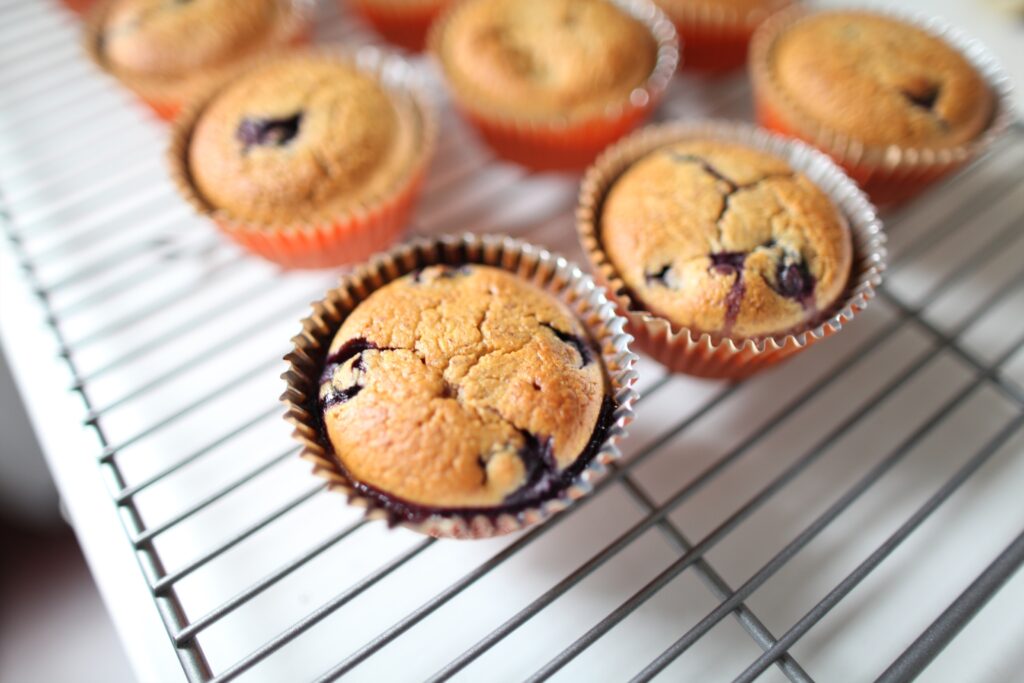 Blueberry muffins on a rack