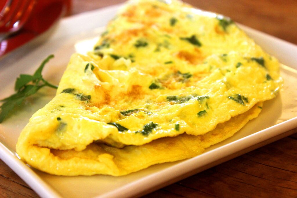 11th egg recipe: omelette with green onions and red peppers